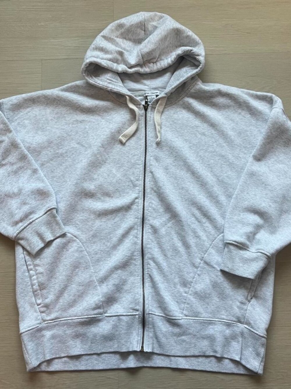 Light grey zip-up hoodie